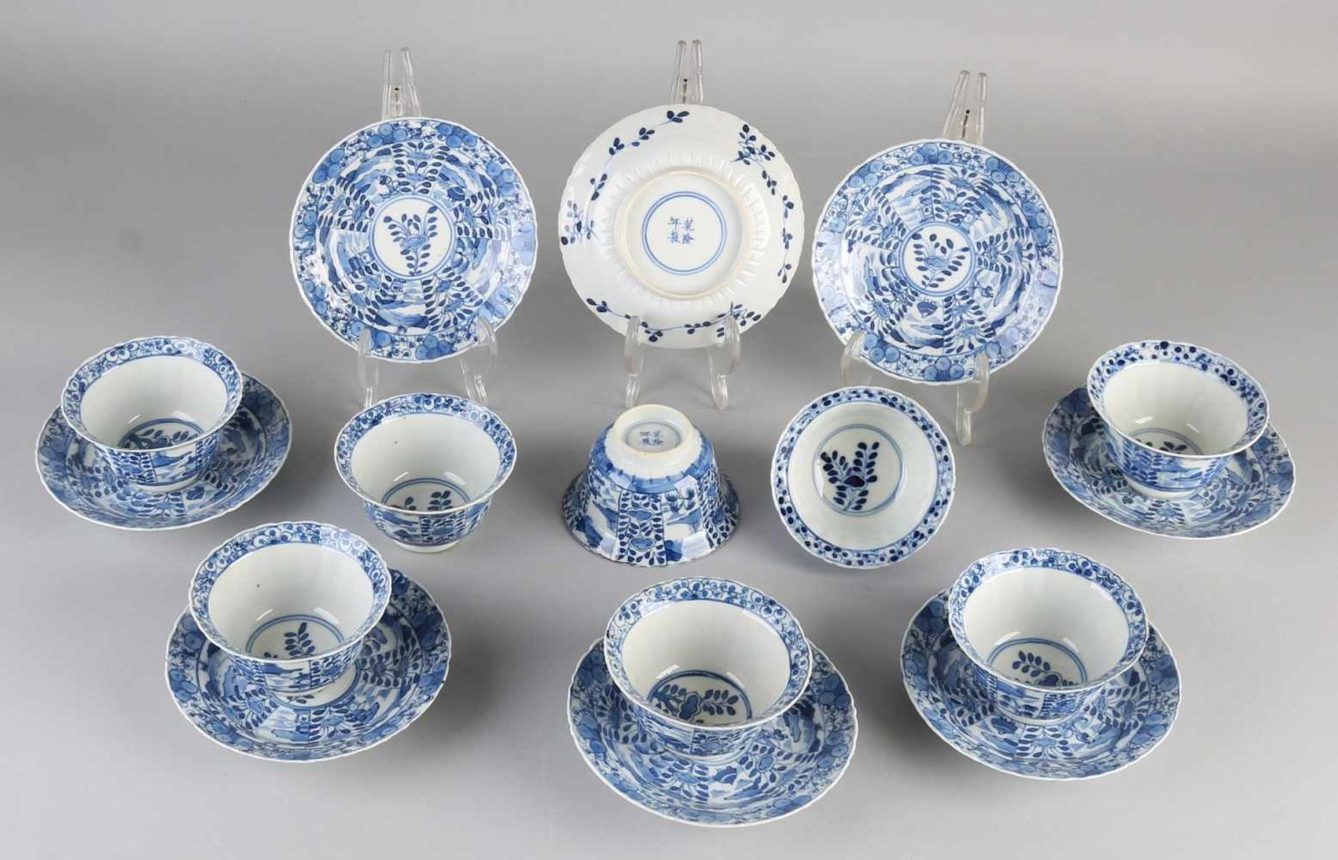 Eight pieces of 19th century Chinese porcelain cups and saucers with landscapes / scenery