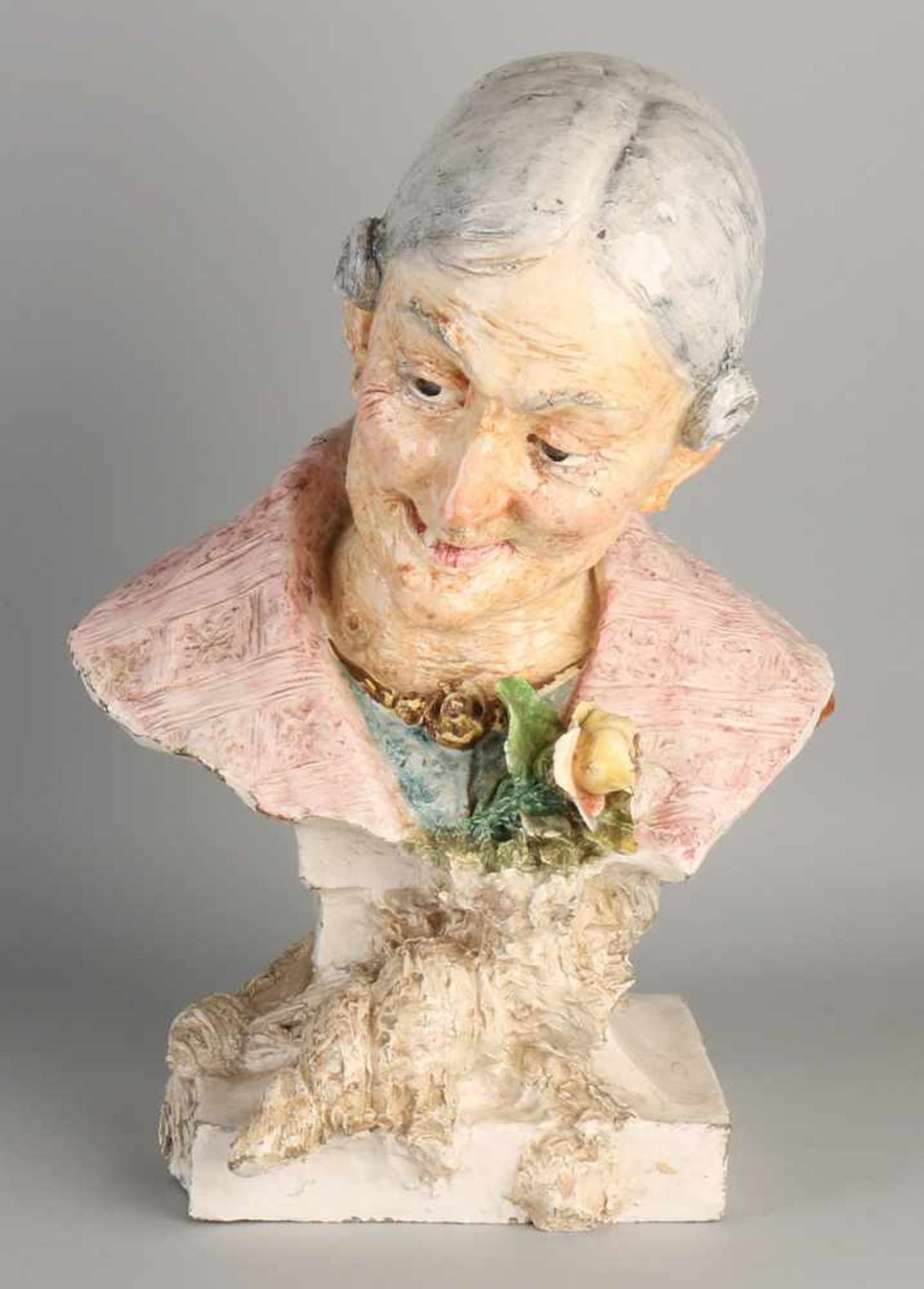 Antique ceramic bust of an old lady with rose. Circa 1900. Unsigned. Rose slightly damaged. Size: