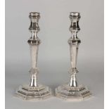 Two silver table candlesticks 800/000, Louis XIV style, on an octagonal base. ø13x29cm. MT .: