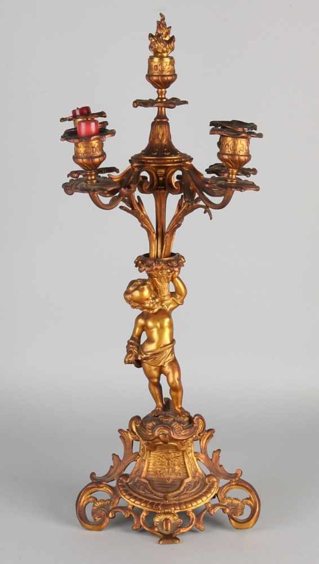 19th Century gilt bronze candle candelabra with putti. Size: H 54 cm. In good condition.