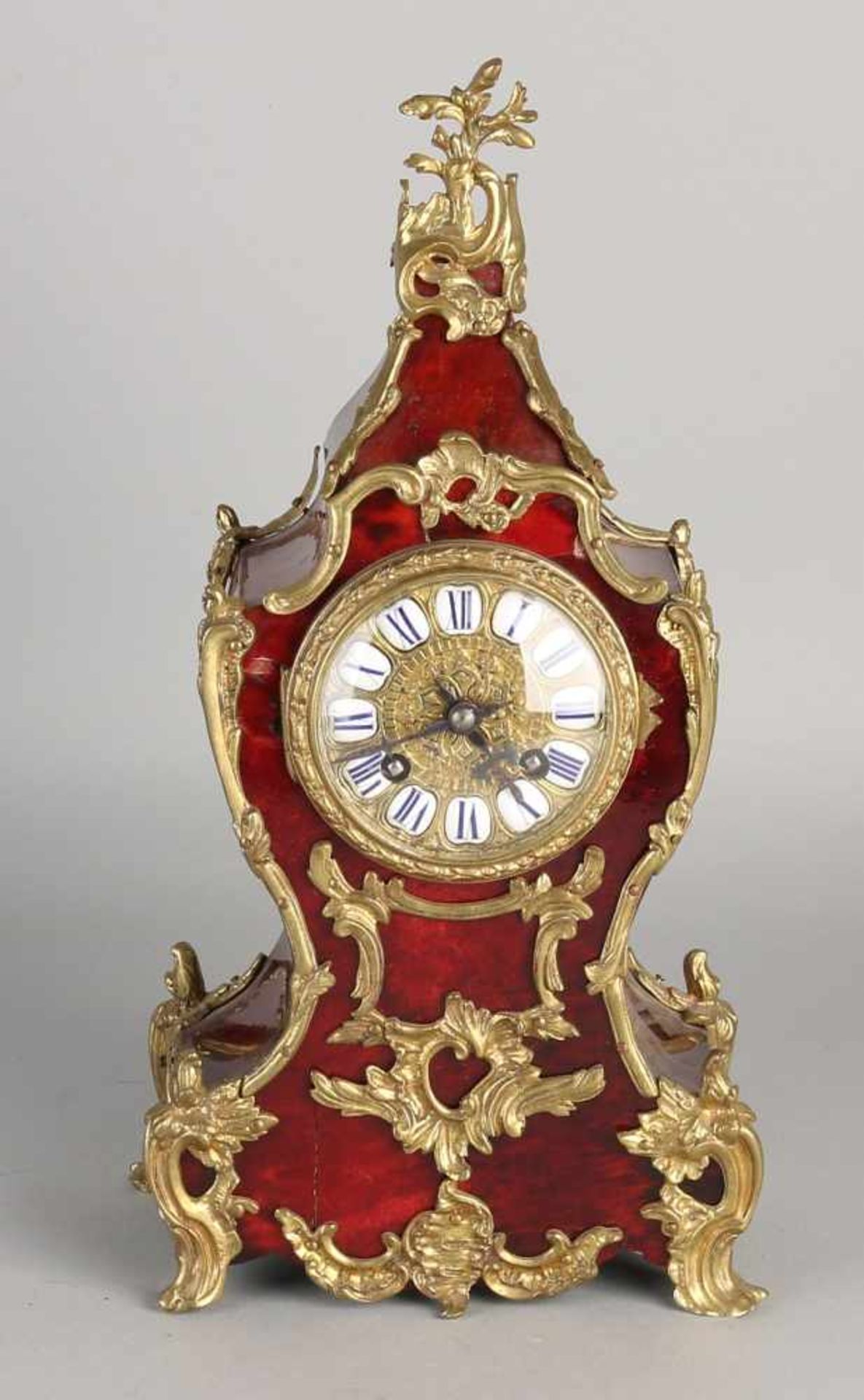 19th Century French clock with tortoise glued and bronze fittings. Eight day-watch, enamel