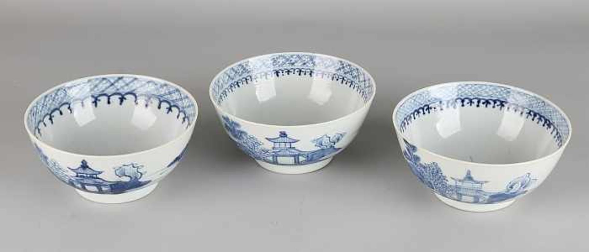 Three antique Chinese porcelain bowls with coastal resort decor and pagodas. Circa 1800. All