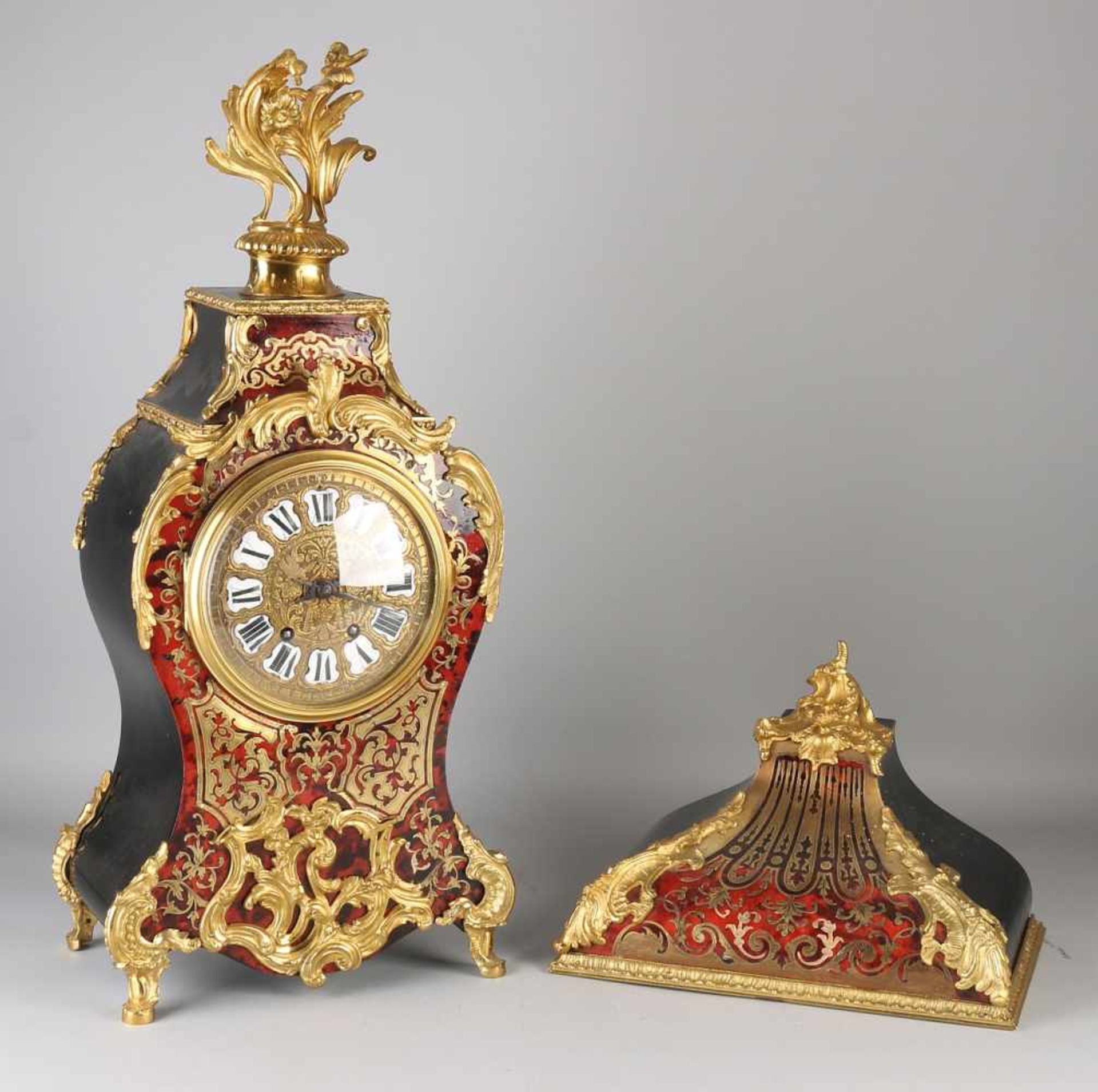19th Century French red turtle boulle clock with original console and gilt bronze mounts. Circa