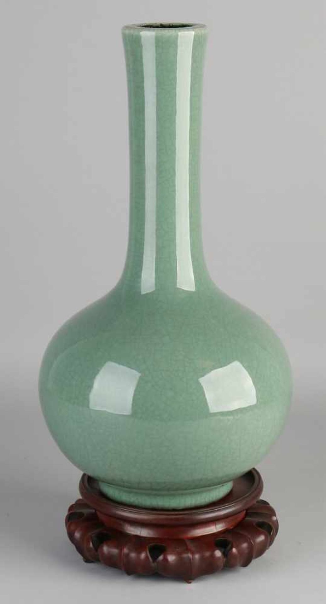 Large Chinese porcelain vase pipe with green celadon crackle glaze. Bottom Brand. Wood stabbed