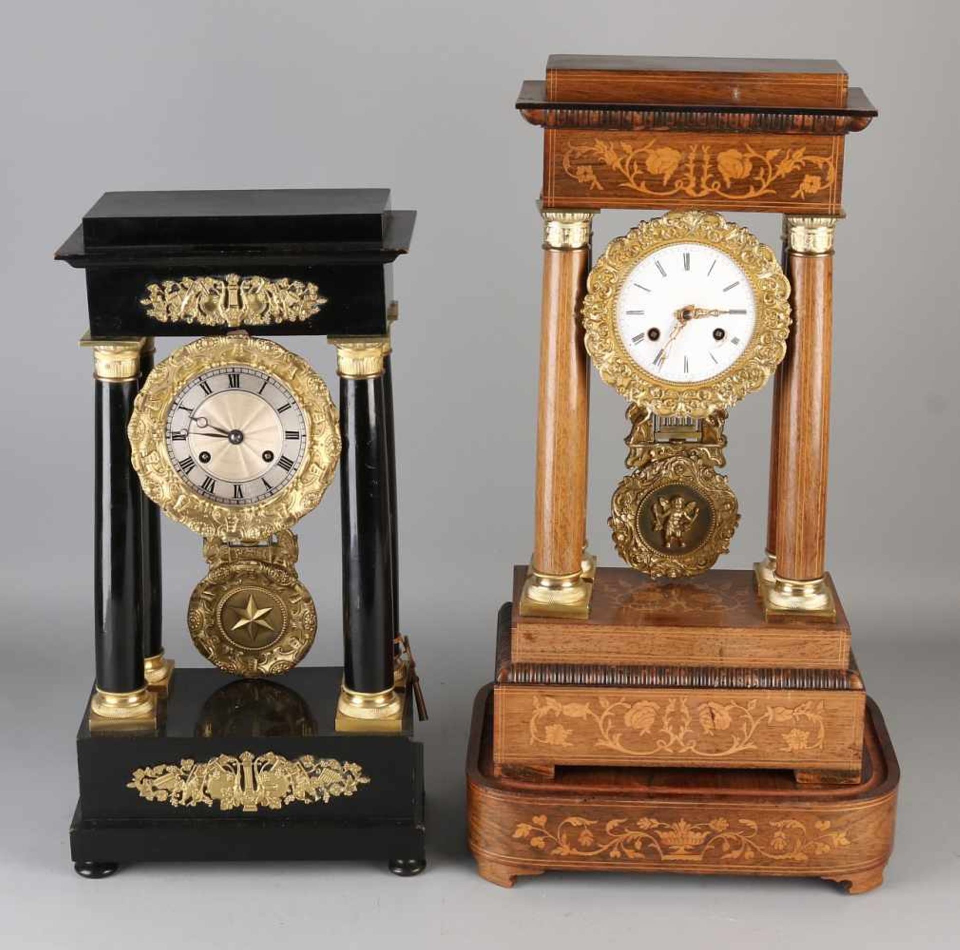 Two column clocks. One time 19th century French geeboniseerde column clock with gilt brass