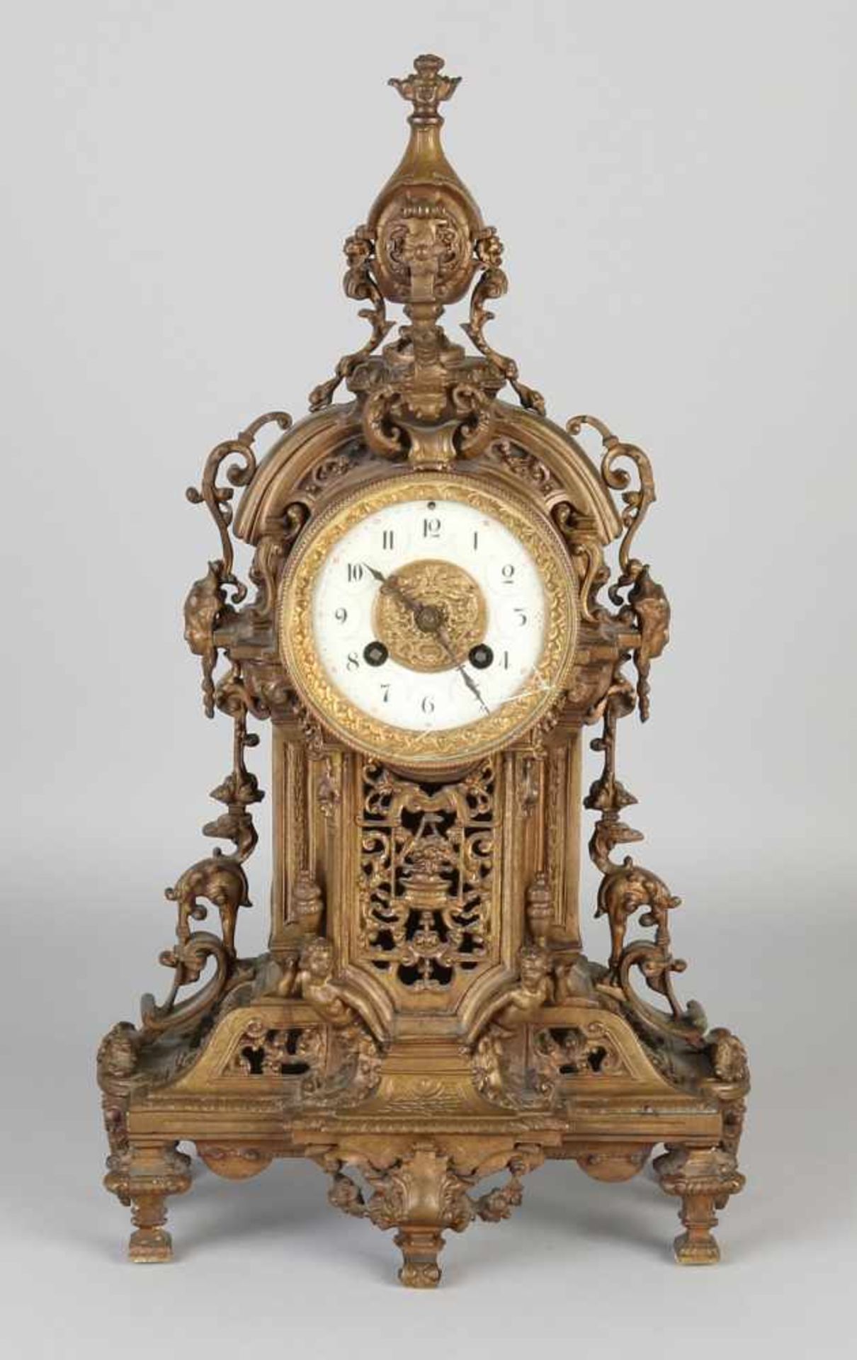 Antique French Neo Renaissance bronze mantel clock with vines and caryatids. Circa 1880. Eight day-