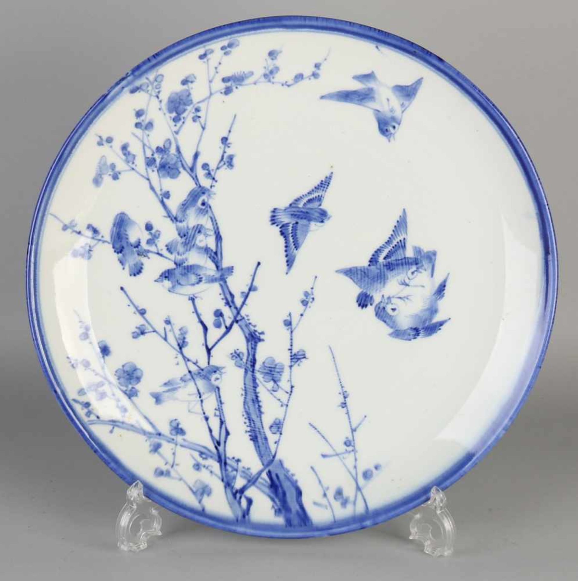 Large 19th century Japanese porcelain dish with birds / blossom decor. Size: ø 37 cm. In good