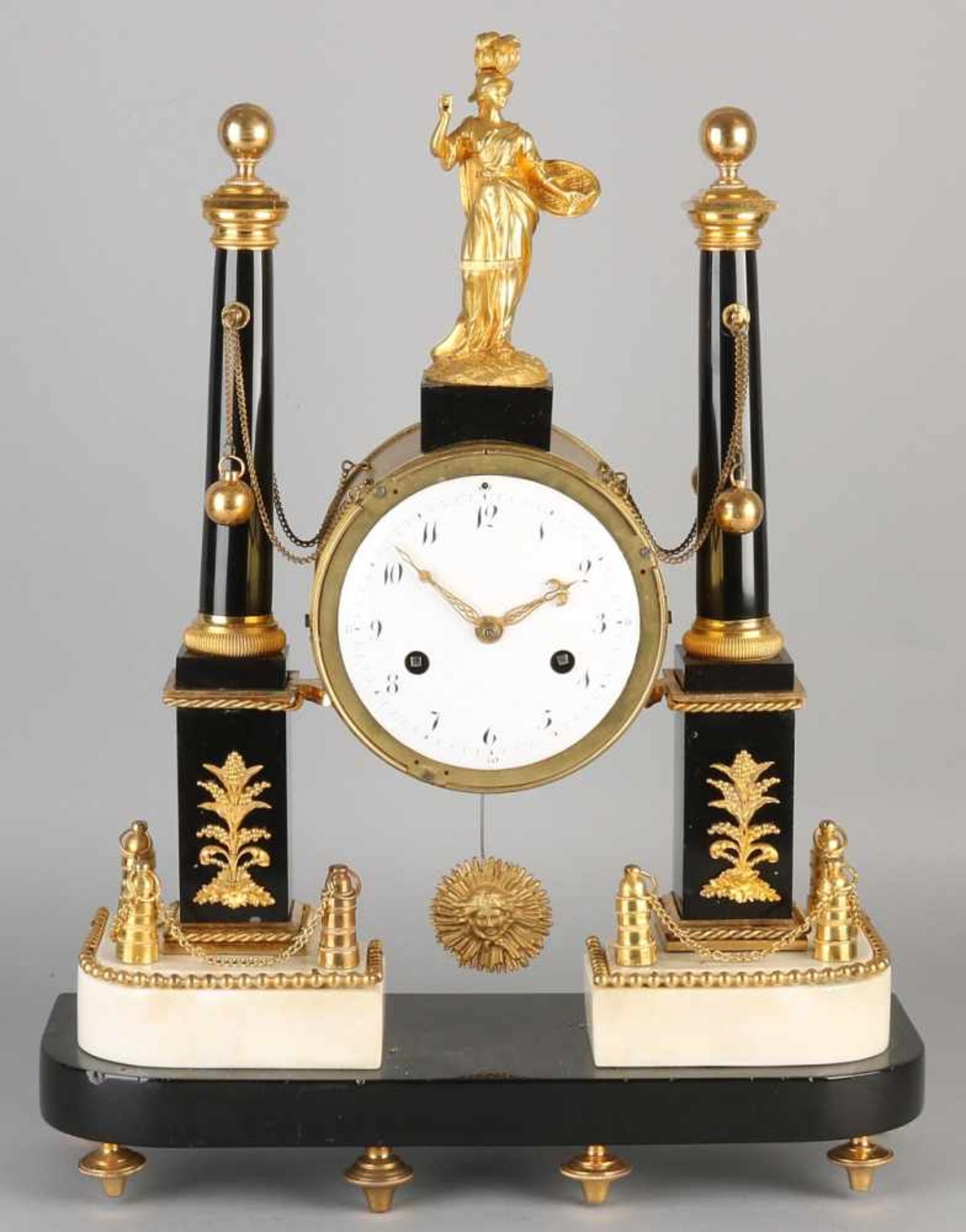 18th Century French Louis XVI marble mantel clock with gilt bronze ornaments. Circa 1780. Eight