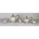 Fine silver coffee service, 833/000, 5 parts of a coffee and tea pot, a milk jug, a sugar bowl and