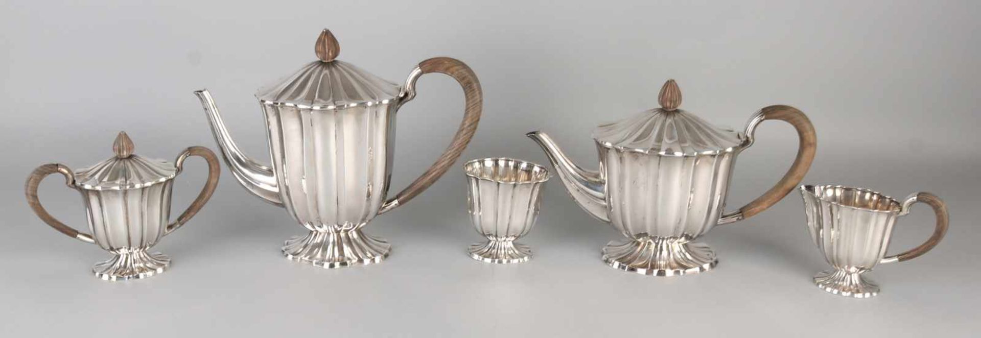 Fine silver coffee service, 833/000, 5 parts of a coffee and tea pot, a milk jug, a sugar bowl and