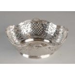 Silver basket, 835/000, oval sawed model with molded decor edge and grid interspersed with curls.