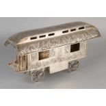 Silver truck pull, 925/000, with cut window shutters, decorated with swirls and scrolls. With