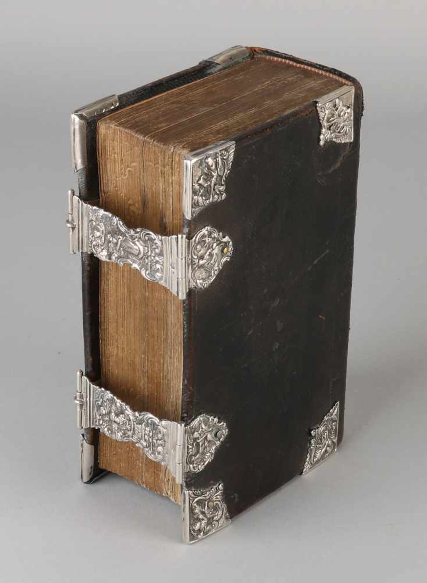 Bible with silver 833/000. Bible with black leather cover, in 1798, has 8 silver corner pieces and a