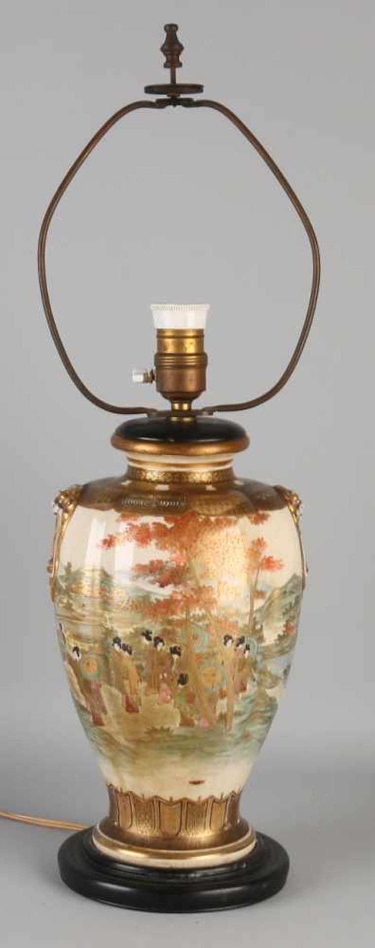 Antique Japanese Satsuma porcelain table lamp with finely decorated figures in landscape and gold