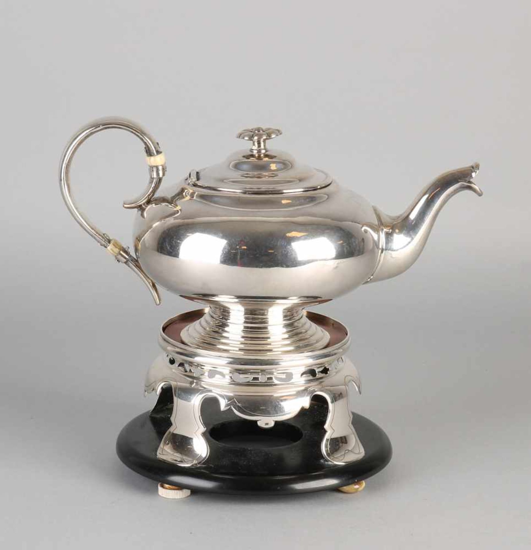 Silver teapot on Comfoor, 833/000. Silver teapot sphere model, on circular base with rings, provided