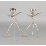 Two silver candlesticks 925/000, Art Deco, in the form of stylized figures. MT .: Orhan Güler.