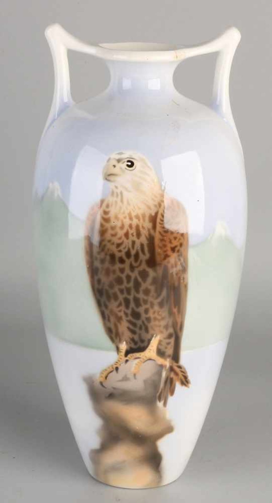 Large antique Societé Maastricht Nouveau ceramic vase with falcon. Circa 1910. Dimensions: H 37