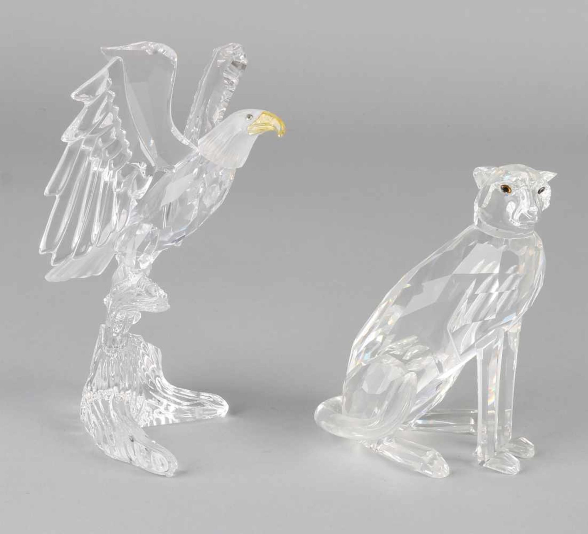 Two parts Swarovski in good condition and with original boxes: 1x Cheetah (183,225) is carried out