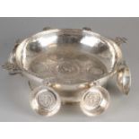 Special silver serving dish with six trays, only includes old Spanish coins. Round hammered scale on