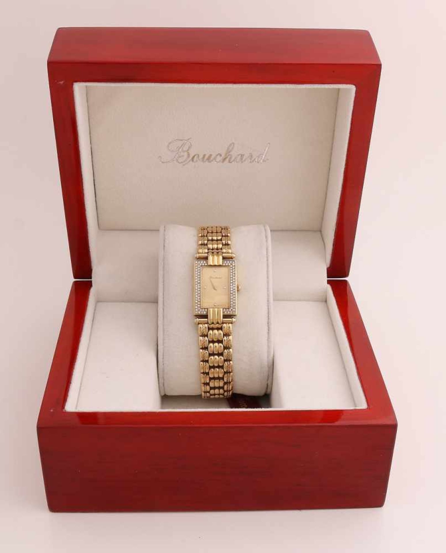 Gelbgold Bouchard Damenuhr, 750/000, mit Diamanten. Uhr mit einem rechteckigen Gehäuse, 24 x 18