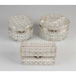 Drei Kristalldeckelboxen mit vernickelten Messingrahmen. 20. Jahrhundert. Größe: 12 - 15 cm. In