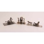 Drei silberne Miniaturen auf Teller, 835/000, mit einer Figur mit Kanone, 6,5x3x3cm, Figur im