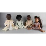 Vier deutsche schwarze Puppen. Um 1930 - 1940. Bestehend aus: Armand Marseille, Junge.