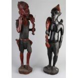 Zwei große afrikanische Holz geschnitzte Figuren mit Springböcken auf der Schulter. 20. Jahrhundert.
