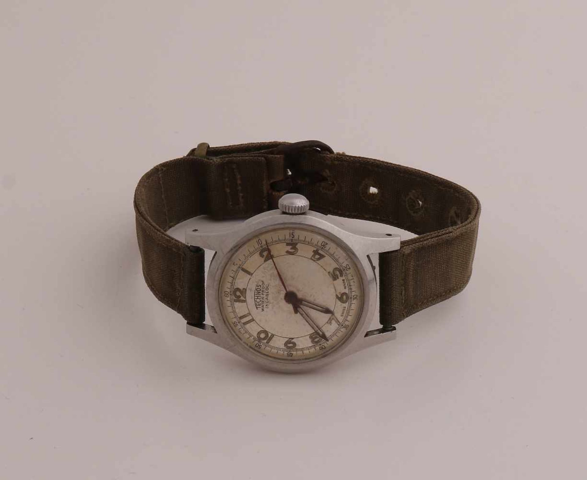 Holländische Uhr aus weißem Metall, Technos, wasserdichtes Incabloc, mit einem Canvas-Armband. ø