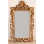 Großer vergoldeter geschnitzter Spiegel mit facettiertem Spiegelglas. Abmessungen: H 140 x B 76