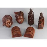 Sechs asiatische Holzschnitzereien. Einschließlich: Buchstützen (Indonesien), Masken. 20.