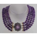 Spezielle Halskette aus Amethysten mit Goldverschluss, 585/000, mit Amethyst und Diamanten.