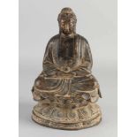 Chinesischer Bronzebuddha auf Lotusblume. Mit Restvergoldung und Hakenkreuz auf der Brust.
