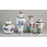 Vier Teile chinesisches Porzellan. Bestehend aus: Zwei kantonesische Vasen, ein Haaransatz. Ein