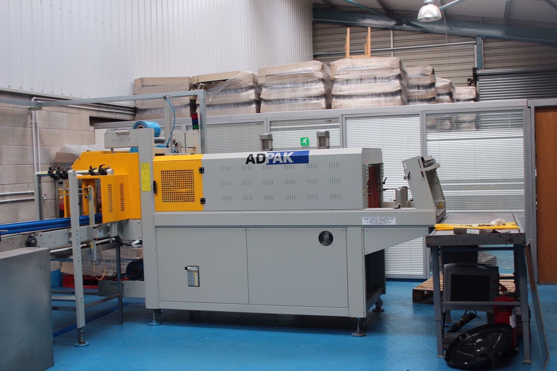ADPAK SMIPACK AUTOMATIC SLEEVE WRAPPING MACHINE