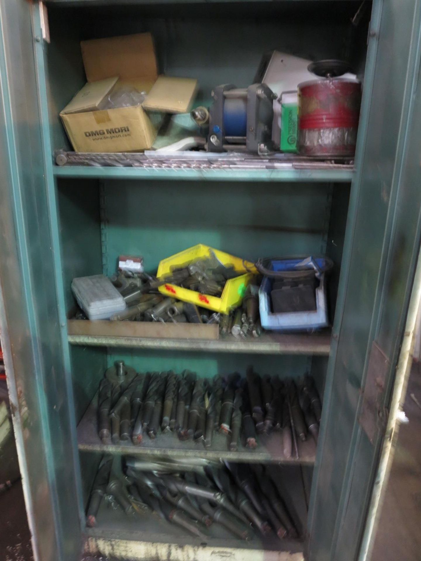 LOT - 2-DOOR STORAGE CABINET FULL OF LARGE TAPER DRILLS, BORING BARS AND RELATED ITEMS