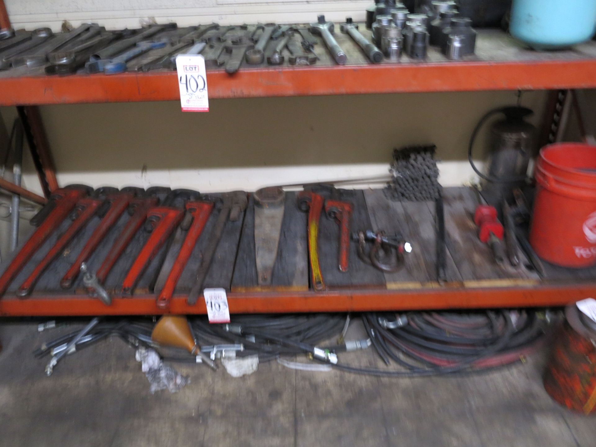 LOT - (9) PIPE WRENCHES UP TO 4', SLIDE HAMMER, ETC.