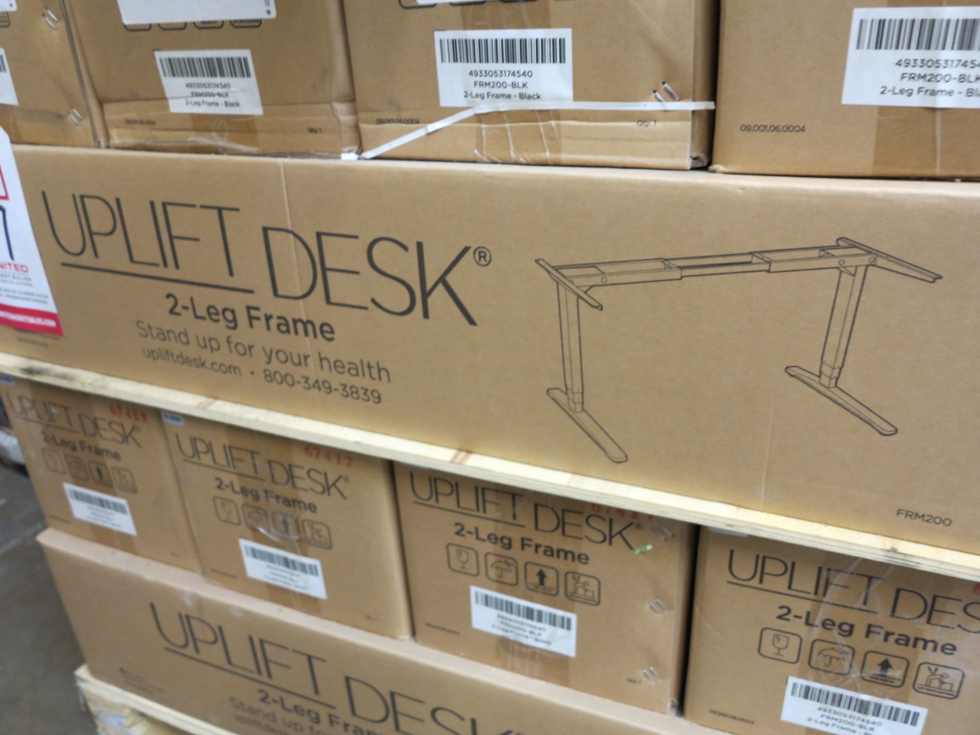 LOT - PALLET OF UPLIFT DESK 2-LEG FRAMES, PLUS BOX OF 2-INPUT CONTROL BOX W/ POWER CORD FOR UPLIFT - Image 2 of 2