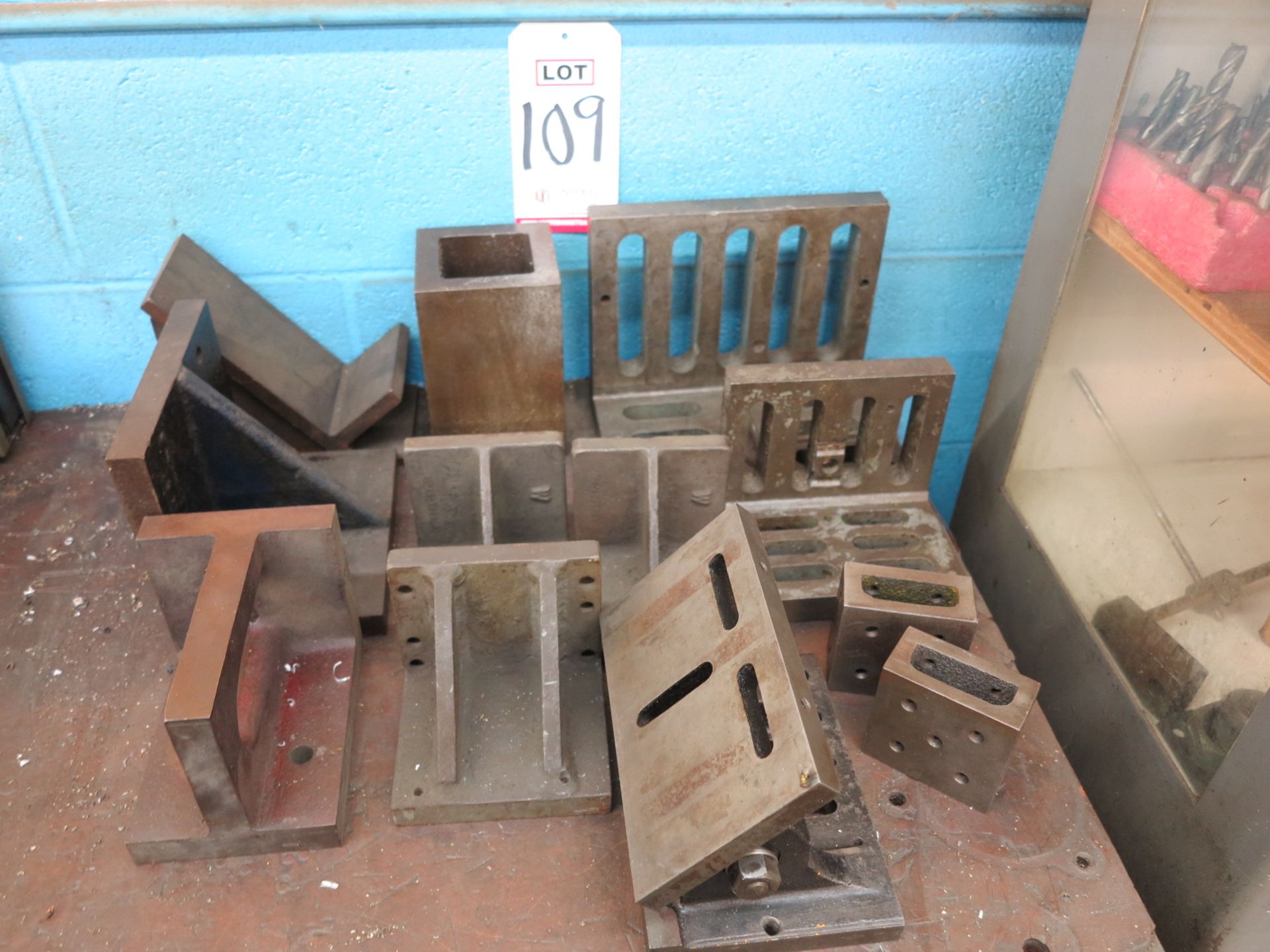 LOT - (12) MISC ANGLE PLATES, ETC.