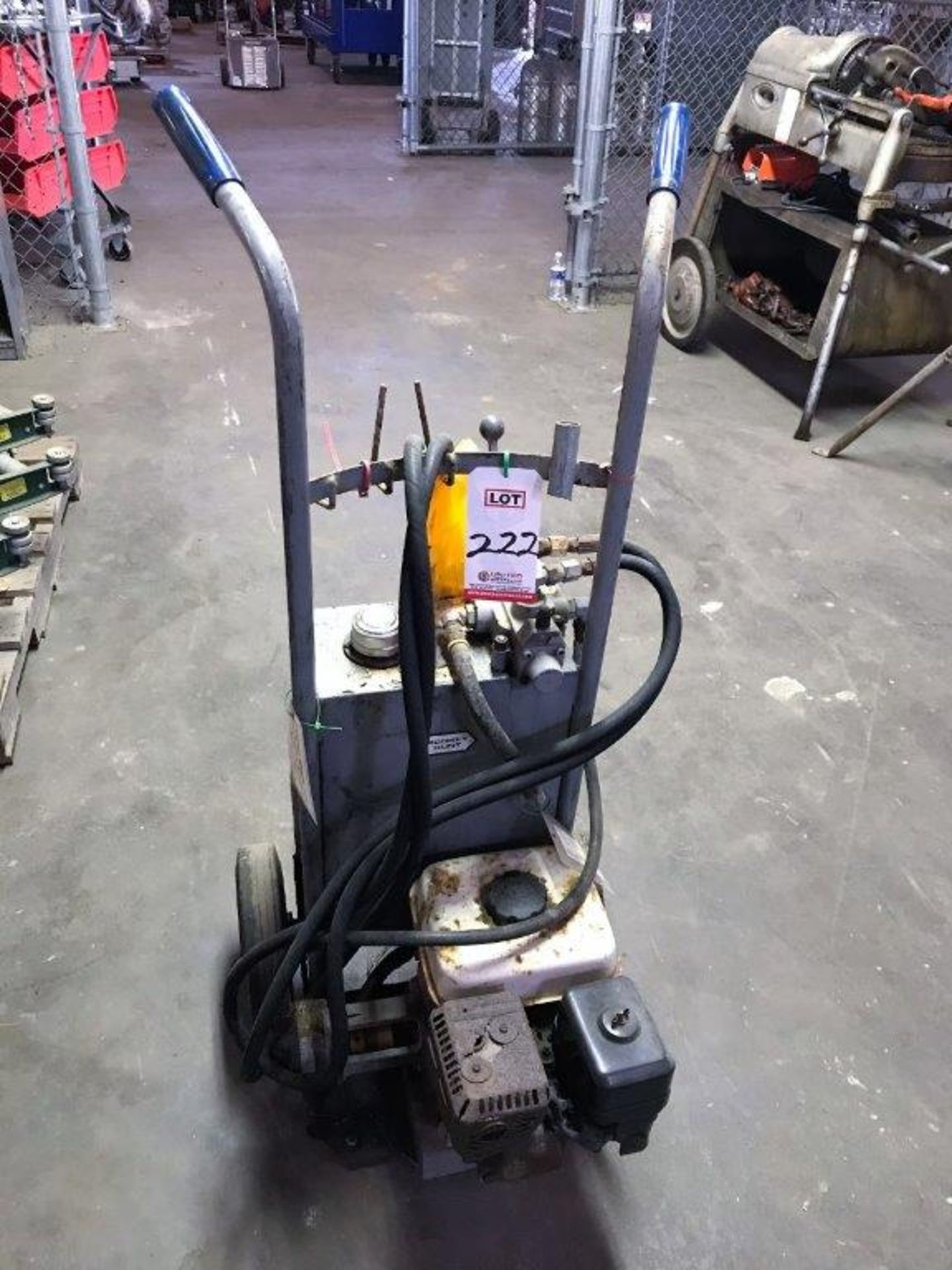 GAS POWERED HYDRAULIC UNIT W/ HONDA, 5.5 HP. GAS MOTOR, ON 2-WHEEL CART