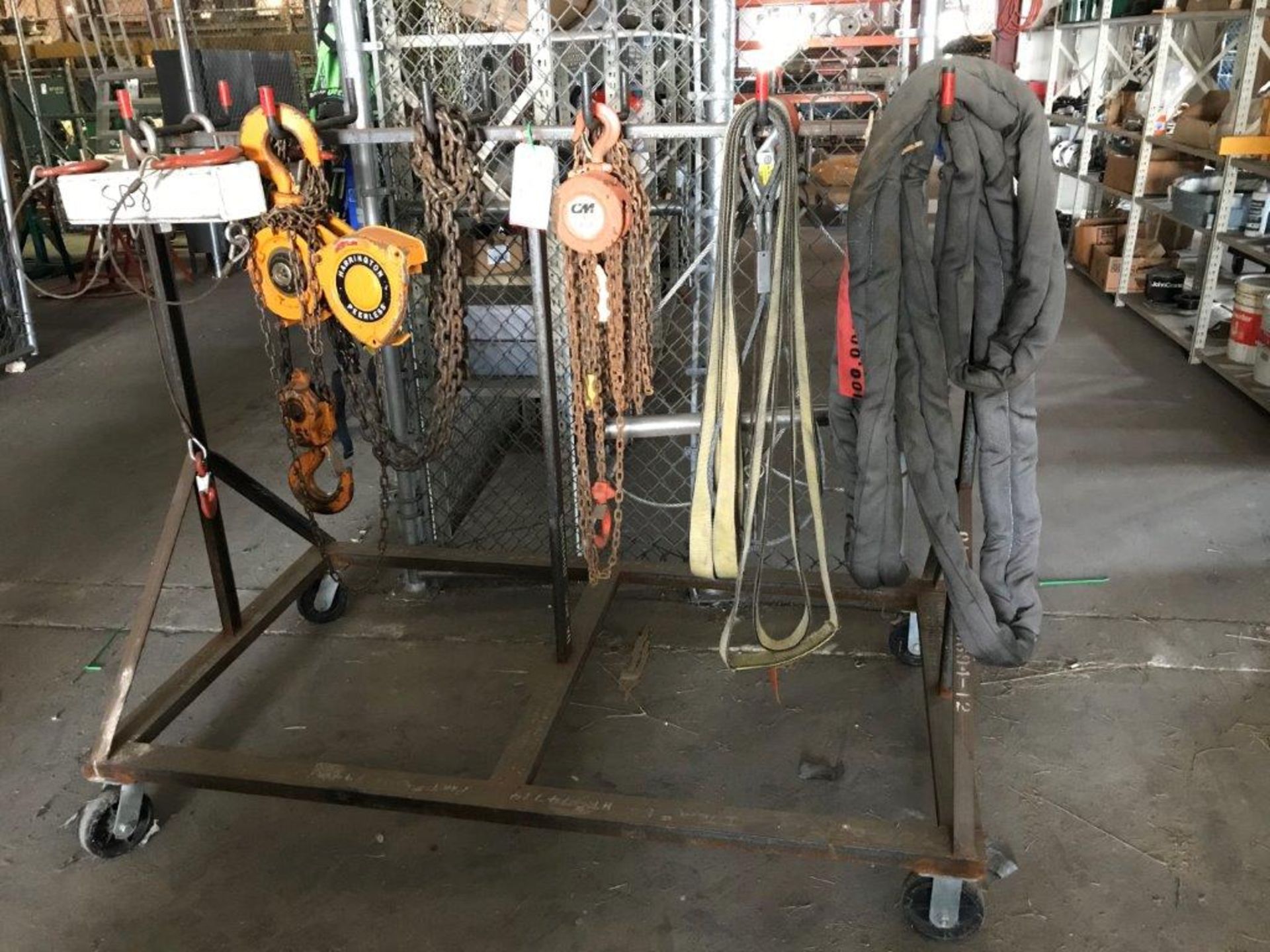 LOT - MOBILE RACK W/ ASSORTED LIFTING EQUIPMENT, CHAIN HOISTS, SPREADER BARS, STRAPS