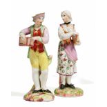 PORCELAIN FIGURES OF A MAN AND WOMAN WITH LYRE.