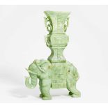 ELEPHANT WITH VASE WITH MOVEABLE RINGS ON HIS BACK.