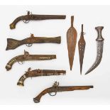 FIVE FLINTLOCK GUNS, TWO SPEAR HEADS AND A DJAMBIA DAGGER.