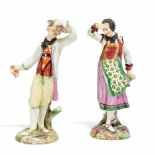 PORCELAIN FIGURES OF TWO DANCERS IN TRADITIONAL COSTUMES.