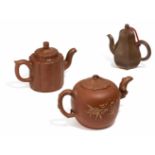 THREE ZISHA TEA POTS.