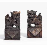 PAIR OF SHIZI LIONS ON BASES.