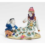 PORCELAIN FIGURE OF A RUSSIAN MOTHER WITH CHILD.