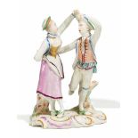 PORCELAIN FIGURE OF A DANCING COUPLE.