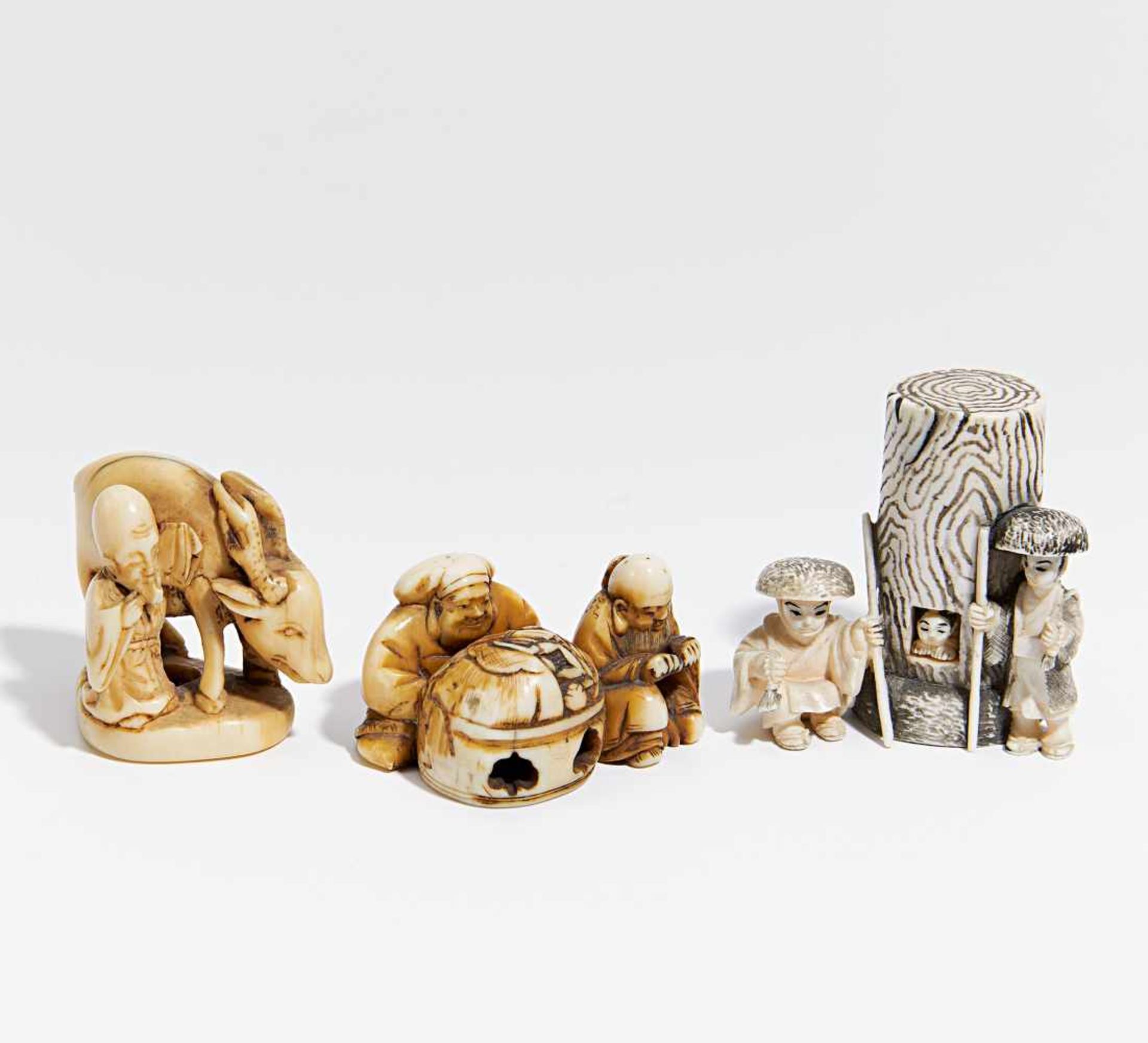 TWO NETSUKE WITH GOOD FORTUNE GODS.